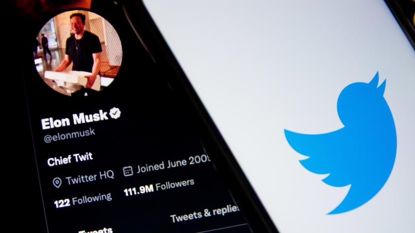 In this photo illustration a Twitter logo seen displayed on a smartphone screen with Elon Musk Twitter in the background in Athens, Greece on October 30, 2022. Elon Musk begins his Twitter ownership with firings. (Photo by Nikolas Kokovlis/NurPhoto via Getty Images)