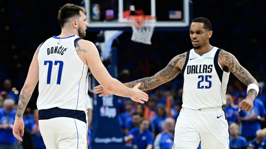 Getty Images - OKLAHOMA CITY, OKLAHOMA - MAY 09: P.J. Washington #25 and Luka Doncic #77 of the Dallas Mavericks high five during the fourth quarter against the Oklahoma City Thunder in Game Two of the Western Conference Second Round Playoffs at Paycom Center on May 09, 2024 in Oklahoma City, Oklahoma. NOTE TO USER: User expressly acknowledges and agrees that, by downloading and or using this photograph, User is consenting to the terms and conditions of the Getty Images License Agreement. (Photo by Joshua Gateley/Getty Images)