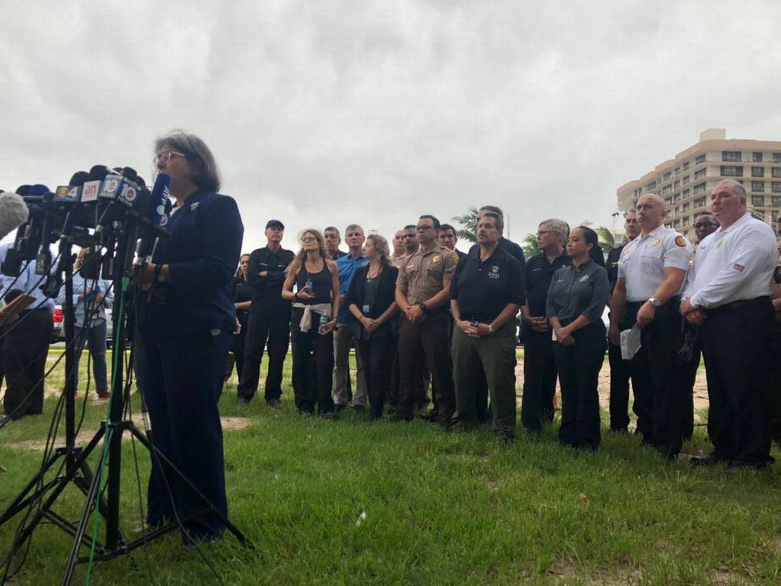 Will rain affect search and rescue at collapsed condo? Storm halted a police briefing