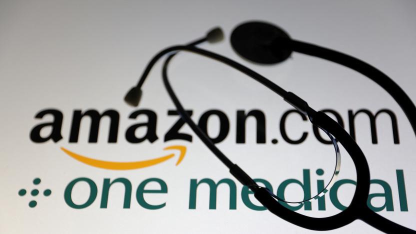 A stethoscope is placed on displayed Amazon.com and One Medical logos in this illustration taken July 26, 2022. REUTERS/Dado Ruvic/Illustration