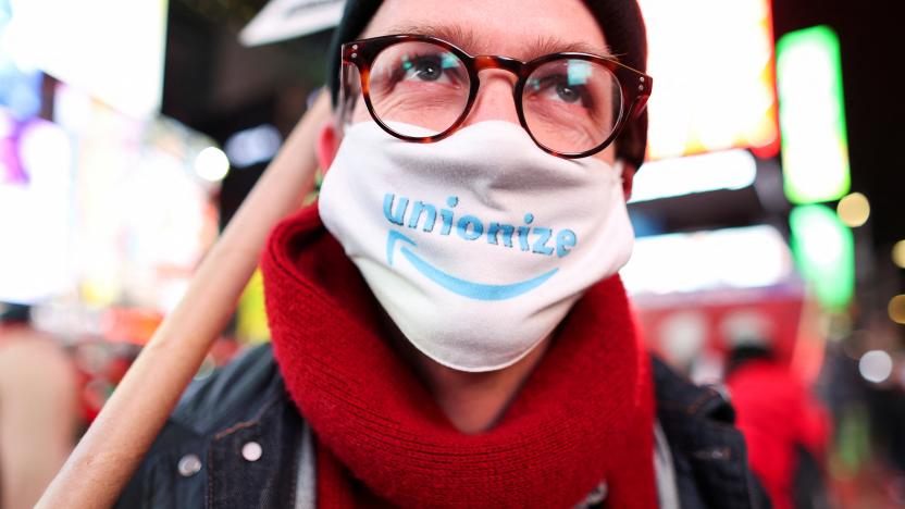 Staten Island Amazon workers protest in Times Square as they demand union rights, in New York City, U.S., December 22, 2021. REUTERS/Ahmed Gaber