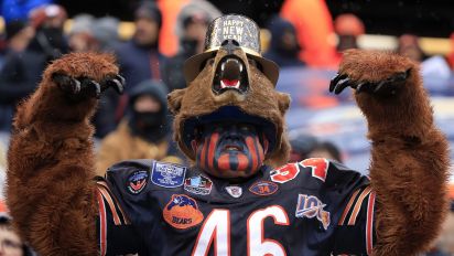 Getty Images - CHICAGO, ILLINOIS - DECEMBER 31: A Chicago Bears fan cheers during a game against the Atlanta Falcons at Soldier Field on December 31, 2023 in Chicago, Illinois. (Photo by Justin Casterline/Getty Images)