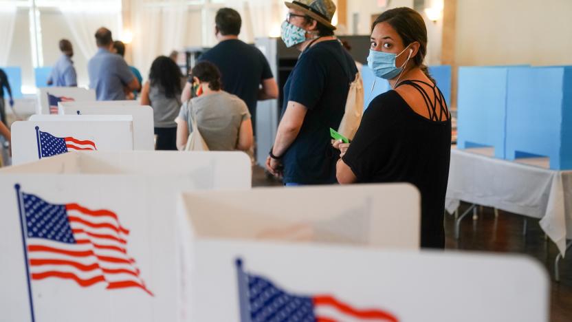 ATLANTA, GA - JUNE 09: People wait in line to vote in Georgia's Primary Election on June 9, 2020 in Atlanta, Georgia. Voters in Georgia, West Virginia, South Carolina, North Dakota, and Nevada are holding primaries amid the coronavirus pandemic. (Photo by  Elijah Nouvelage/Getty Images)