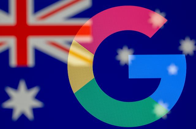 Google logo and Australian flag are displayed in this illustration taken, February 18, 2021. REUTERS/Dado Ruvic/Illustration