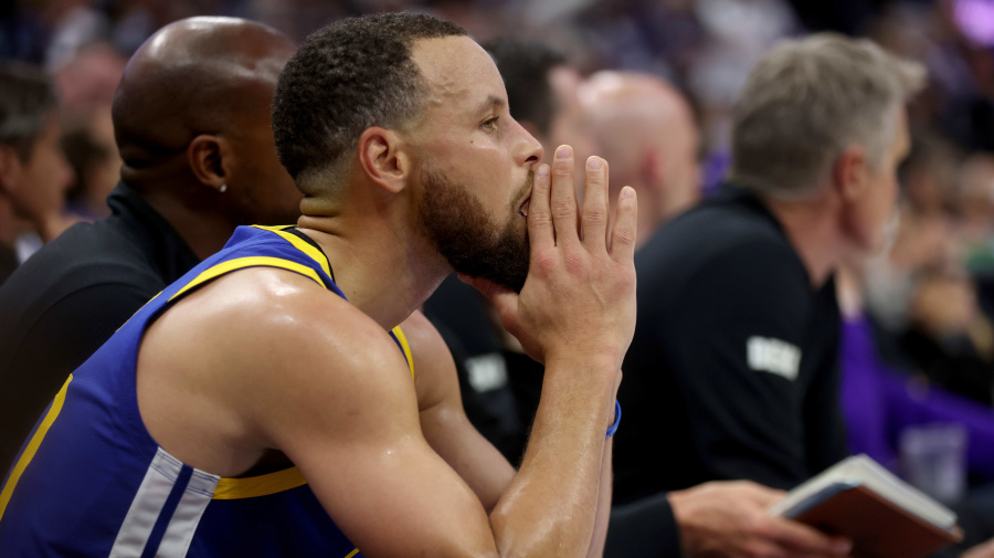 Getty Images - SACRAMENTO, CALIFORNIA - APRIL 16: Golden State Warriors' Stephen Curry #30 watches the last minute of their NBA play-in tournament game against the Sacramento Kings from the bench at the Golden One Center in Sacramento, Calif., on Tuesday, April 16, 2023. The Kings beat the Warriors 118-94. (Jane Tyska/Digital First Media/East Bay Times via Getty Images)