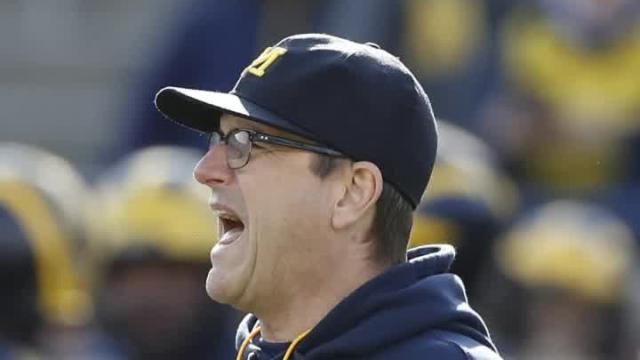 Jim Harbaugh takes a swipe at ex-Ohio State coach Urban Meyer