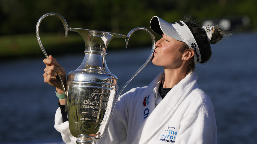 Associated Press - Nelly Korda kisses the trophy while posing for photos after winning the Chevron Championship LPGA golf tournament Sunday, April 21, 2024, at The Club at Carlton Woods in The Woodlands, Texas. (AP Photo/David J. Phillip)