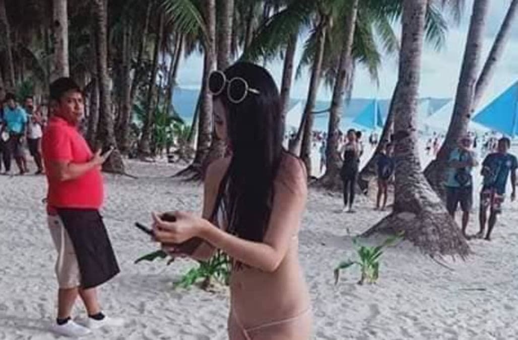 A Taiwanese woman was slapped with a fine over her tiny bikini bottoms whil...