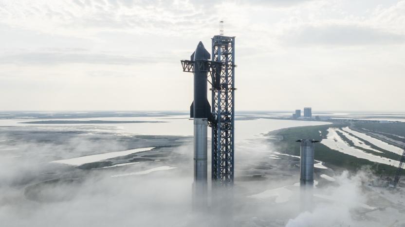 A photo of SpaceX's Starship rocket at the company's Boca Chica facility in Texas. In this photo, Starship's upper stage is stacked on the rocket's booster.