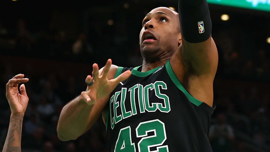 Getty Images - BOSTON, MASSACHUSETTS - MAY 01: Al Horford #42 of the Boston Celtics takes a shot over Delon Wright #4 of the Miami Heat during the third quarter of game five of the Eastern Conference First Round Playoffs at TD Garden on May 01, 2024 in Boston, Massachusetts. NOTE TO USER: User expressly acknowledges and agrees that, by downloading and/or using this Photograph, user is consenting to the terms and conditions of the Getty Images License Agreement.  (Photo by Maddie Meyer/Getty Images)