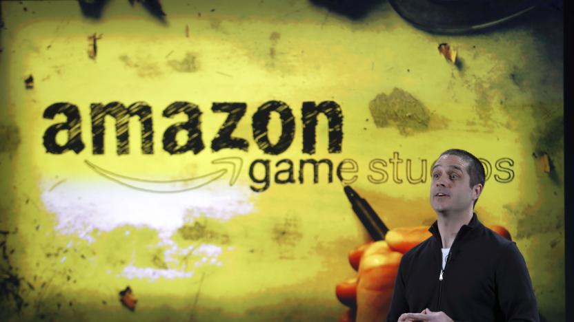 Amazon's vice president of games, Mike Frazzini speaks to media as he displays the Amazon Fire TV during a news conference in New York, April 2, 2014. Amazon.com Inc unveiled a $99 video streaming device called Fire TV that the e-commerce company promised would be more powerful and easier to use than rival services by Apple Inc, Google Inc and Roku. Amazon is a latecomer to the set-top TV market that is dominated by the Apple TV. Amazon customers have a large appetite for film and TV, but many already own similar devices, analysts said.  REUTERS/Eduardo Munoz (UNITED STATES - Tags: SCIENCE TECHNOLOGY BUSINESS)