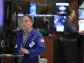 Stock market today: Wall Street gains as earnings come in ahead of more labor market data