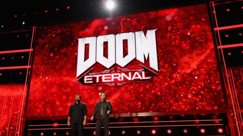 LOS ANGELES, CALIFORNIA - JUNE 09:   (L-R) Hugo Martin, Art Director at Id Software, and Marty Stratton, Executive Producer and Game Director at Id Software, preview 'Doom Eternal' during the Bethesda E3 Showcase at The Shrine Auditorium on June 09, 2019 in Los Angeles, California. (Photo by Christian Petersen/Getty Images)