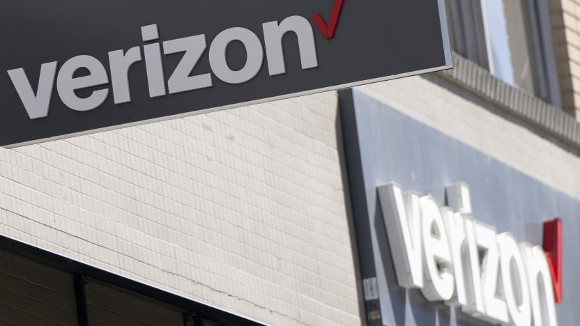 Signs are displayed outside a Verizon retail location on Tuesday, May 14, 2024, in Portland, Ore. (AP Photo/Jenny Kane)