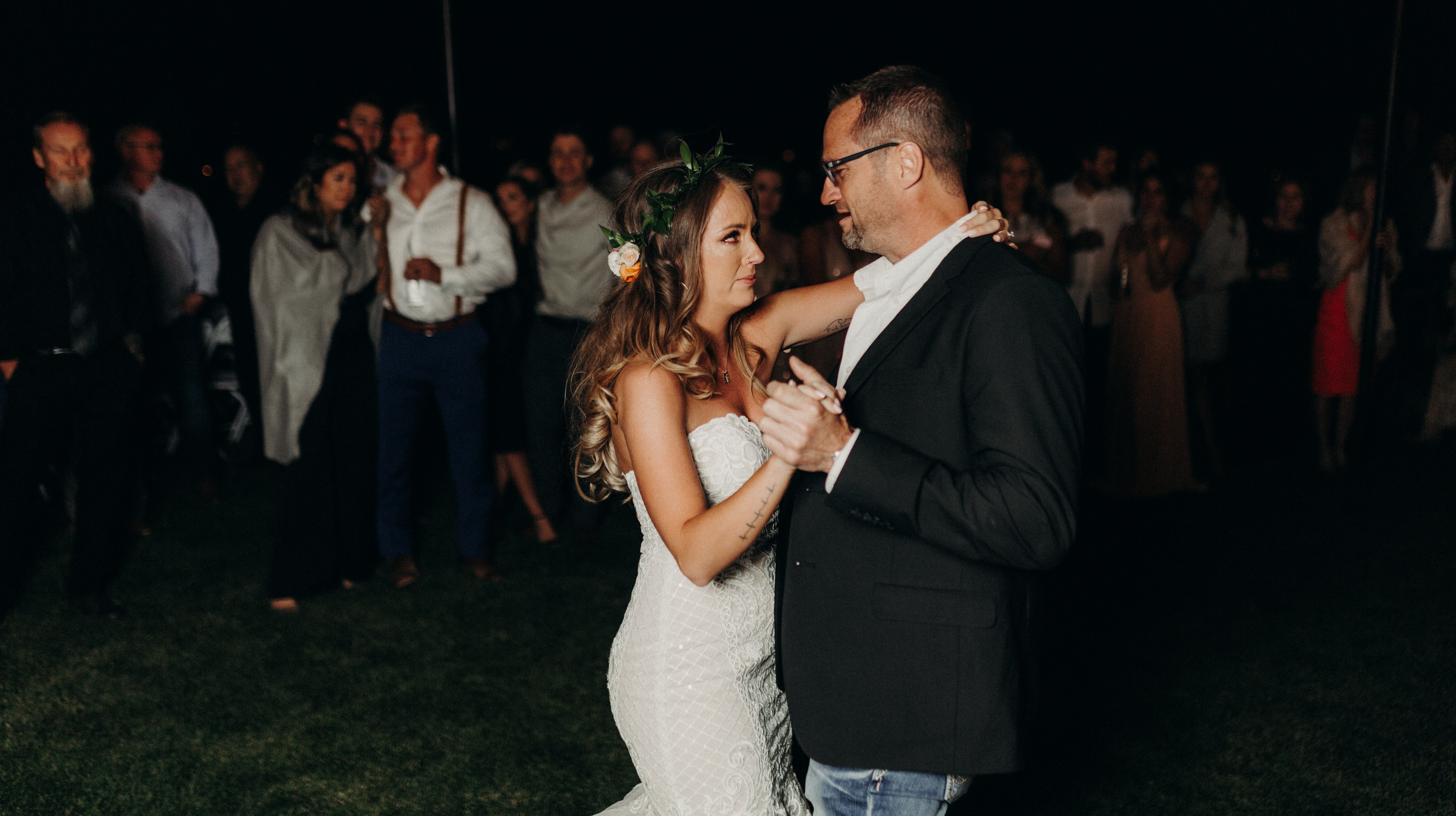 Daughter of murdered police officer dances with his colleagues at her wedding