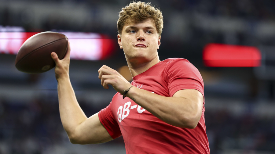 Getty Images - INDIANAPOLIS, INDIANA - MARCH 2: J J McCarthy #QB05 of Michigan warms up during the NFL Combine at the Lucas Oil Stadium on March 2, 2024 in Indianapolis, Indiana. (Photo by Kevin Sabitus/Getty Images)