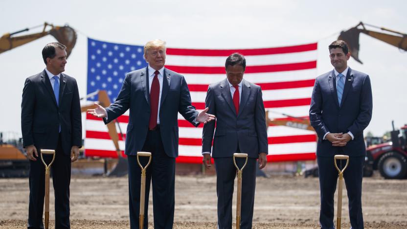 President Donald Trump participates in a Foxconn groundbreaking ceremony, Thursday, June 28, 2018, in Mt. Pleasant, Wis. From left, Gov. Scott Walker, R-Wis., Trump, Foxconn Chairman Terry Gou, and Speaker of the House Rep. Paul Ryan, R-Wis. (AP Photo/Evan Vucci)