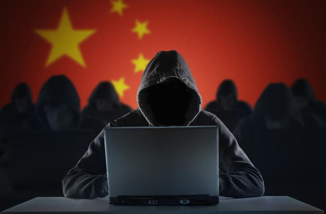 Many chinese hackers in troll farm. Privacy and security concept.