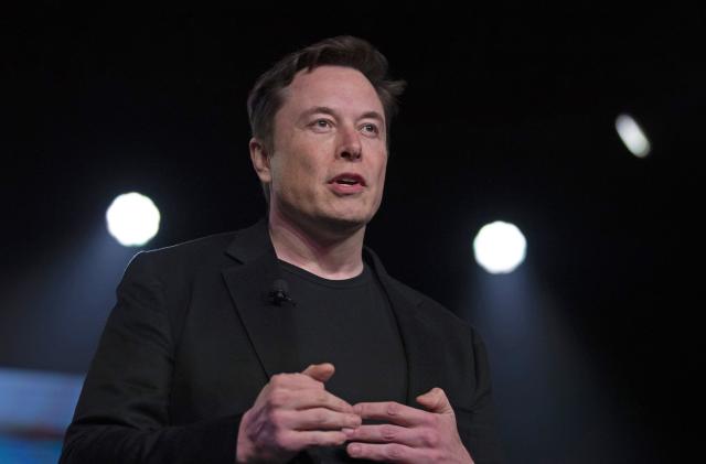 FILE - In this March 14, 2019 file photo, Tesla CEO Elon Musk speaks before unveiling the Model Y at the company's design studio in Hawthorne, Calif. Musk will face the electric car maker's shareholders during the company's annual meeting on Tuesday, June 11. (AP Photo/Jae C. Hong, File)
