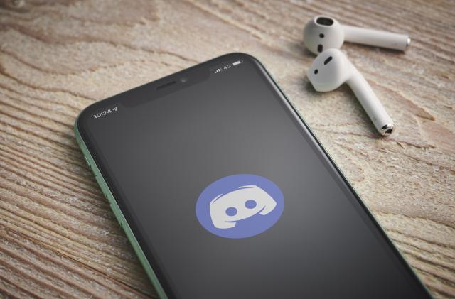 An Apple iPhone 11 smartphone with the Discord software app logo on screen, taken on January 27, 2020. (Photo by Phil Barker/Future Publishing via Getty Images)