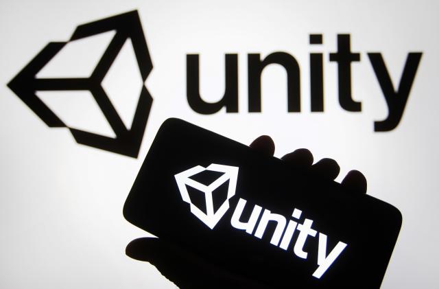UKRAINE - 2021/11/10: In this photo illustration, the Unity Technologies (Unity Software Inc.) logo is seen on a smartphone and a pc screen. (Photo Illustration by Pavlo Gonchar/SOPA Images/LightRocket via Getty Images)
