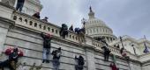 Breaching the U.S. Capitol. (AP)