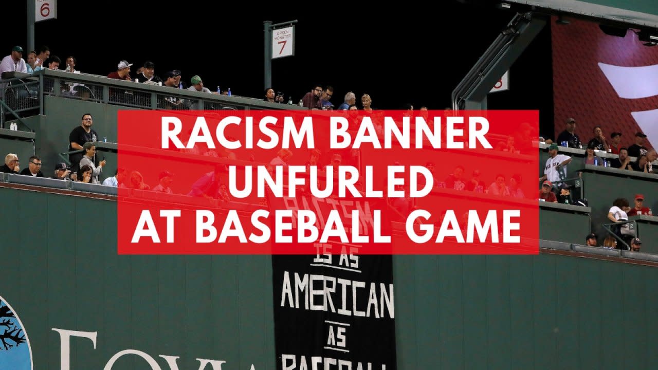 Fans unfurl racism banner from Green Monster during Red Sox game