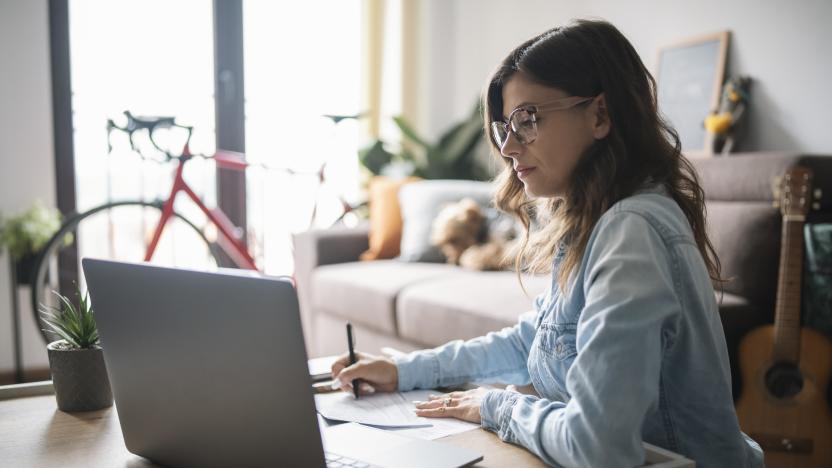 Side view of beautiful businesswoman in home office.