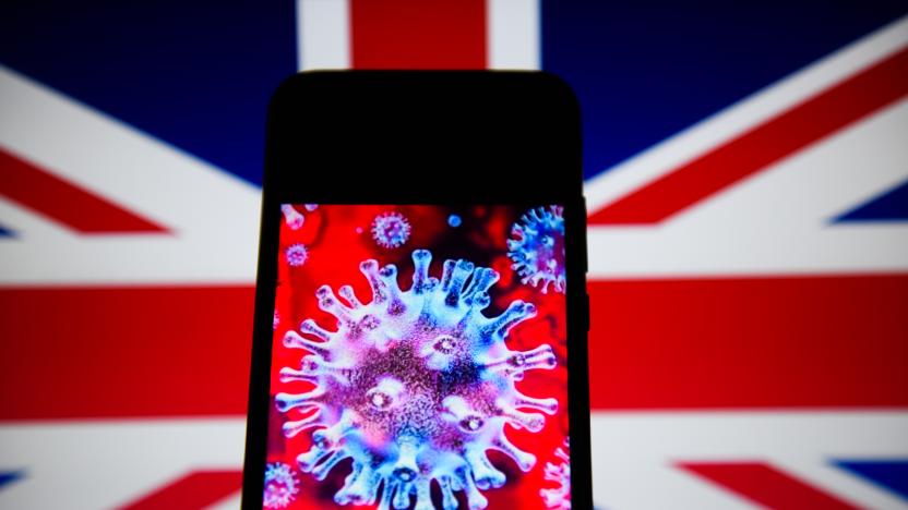 POLAND - 2020/04/10: In this photo illustration a COVID- 19 sample is seen displayed on a smartphone with the United Kingdom flag on the background. (Photo Illustration by Omar Marques/SOPA Images/LightRocket via Getty Images)