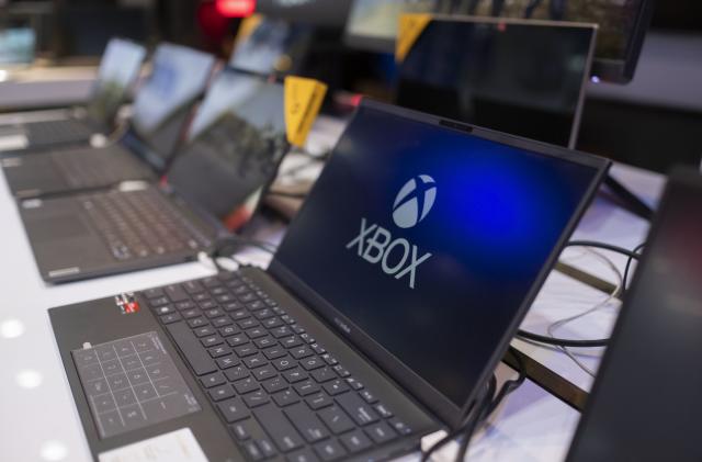 An XBOX logo is seen on a screen of an ASUS ZenBook in an IT-City multi brand shop at the Paytakht computer centre in northern Tehran on December 2, 2021. Despite US sanctions against Iran, Iranians have access to the latest technology in the world of telecommunications and digital, but in most cases at a higher price than the global value of technology goods, but the Iranians prefer to keep themselves update themselves in the field of the computers and telecommunication technology. Even though they have to have to get loan to buy a new smartphone like the iPhone 13. MORTEZA NIKOUBAZL/NurPhoto (Photo by Morteza Nikoubazl/NurPhoto via Getty Images)