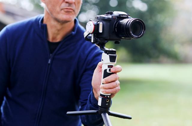 Zhiyun's three-axis camera gimbal houses an LED light and small display