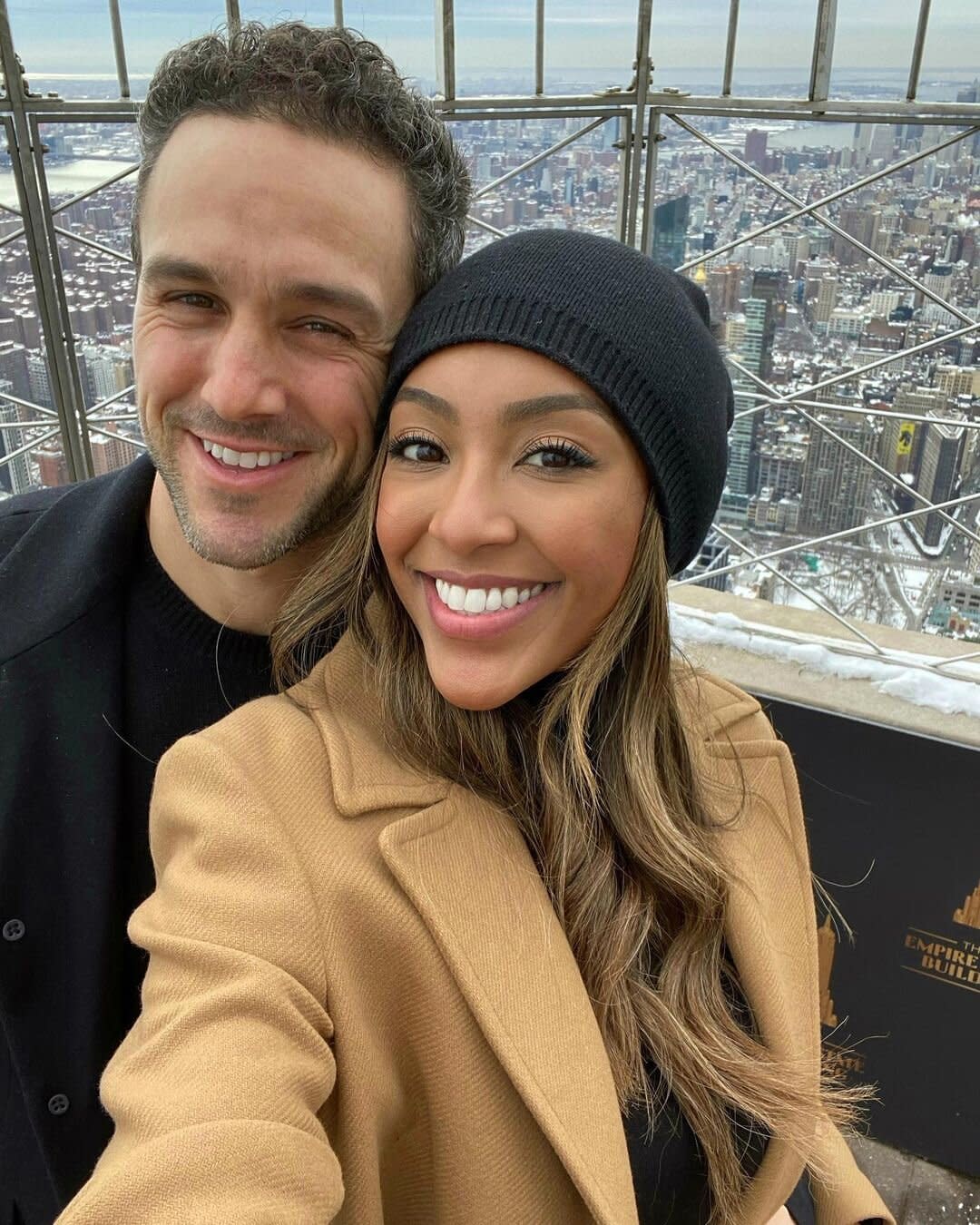 Tayshia Adams denies breaking up with fiance Zac Clark after she was seen without the ring