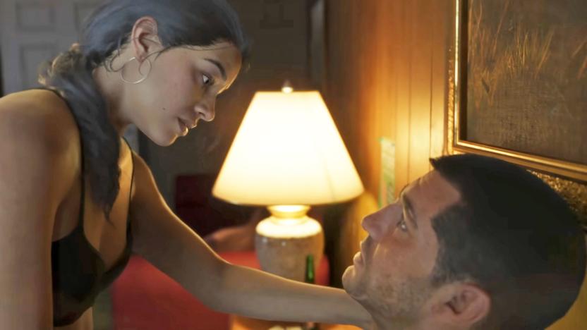 Still from the Grand Theft Auto VI trailer. The game's two protagonists gaze at each other in a hotel room. 