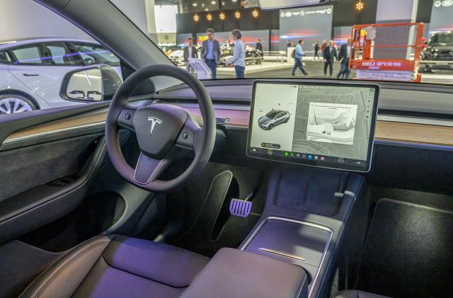 BRUSSELS, BELGIUM - JANUARY 13: Tesla Model Y full electric crossover SUV interior with large touch sreen on the dashboard on display at Brussels Expo on January 13, 2023 in Brussels, Belgium. (Photo by Sjoerd van der Wal/Getty Images)