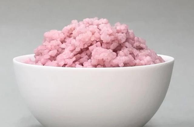 A tasty bowl of pink beef rice.