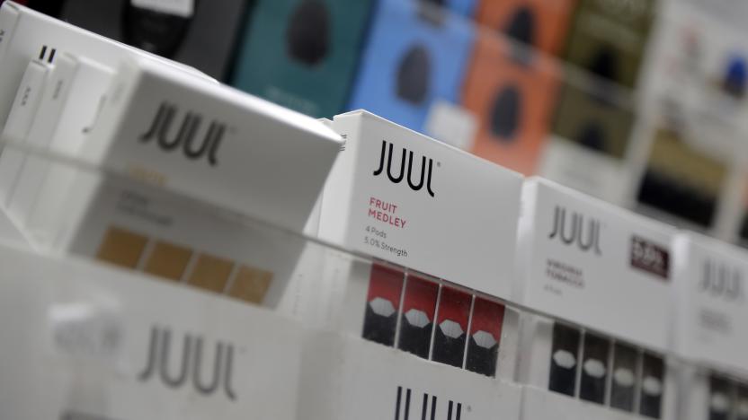 FILE - In this Dec. 20, 2018, file photo Juul products are displayed at a smoke shop in New York. Shares of Altria Group, the nation’s largest tobacco company, fell Thursday, April 25, 2019. Quarterly results were weighed down by $159 million in expenses mainly tied to Altria’s investments in Canadian cannabis investment firm Cronos and Juul, the e-cigarette startup company. (AP Photo/Seth Wenig, File)