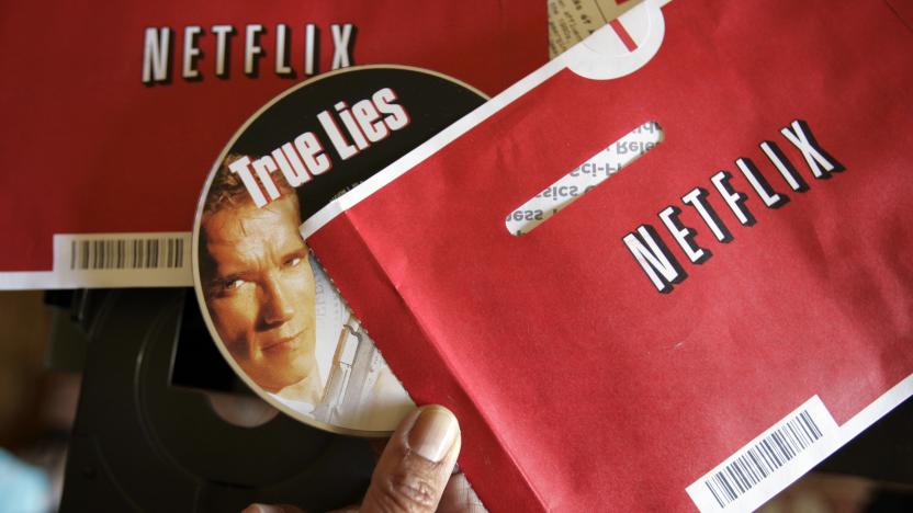 File - Mei Michelson prepares to watch a Netflix DVD at her home in Palo Alto, Calif., on Oct. 22, 2007. The Netflix DVD-by-service will mail out its final discs Friday from its five remaining distribution centers, ending its 25-year history. (AP Photo/Paul Sakuma, File)