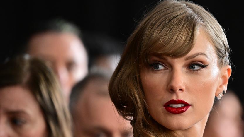 TOPSHOT - US singer-songwriter Taylor Swift arrives for the 66th Annual Grammy Awards at the Crypto.com Arena in Los Angeles on February 4, 2024. (Photo by Robyn BECK / AFP) (Photo by ROBYN BECK/AFP via Getty Images)