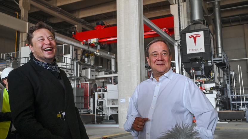 North Rhine-Westphalia's State Premier, Christian Democratic Union (CDU) leader and candidate for Chancellor Armin Laschet (R) and US entrepreneur and business magnate Elon Musk visit the future foundry of the Tesla Gigafactory plant under construction, on August 13, 2021 in Gruenheide near Berlin, eastern Germany. (Photo by Patrick Pleul / POOL / AFP) (Photo by PATRICK PLEUL/POOL/AFP via Getty Images)