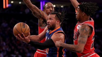 Getty Images - NEW YORK, NEW YORK - APRIL 14: Jalen Brunson #11 of the New York Knicks heads for the net as DeMar DeRozan #11 and Dalen Terry #25 of the Chicago Bulls defend during the first half at Madison Square Garden on April 14, 2024 in New York City. NOTE TO USER: User expressly acknowledges and agrees that, by downloading and or using this photograph, User is consenting to the terms and conditions of the Getty Images License Agreement. (Photo by Elsa/Getty Images)