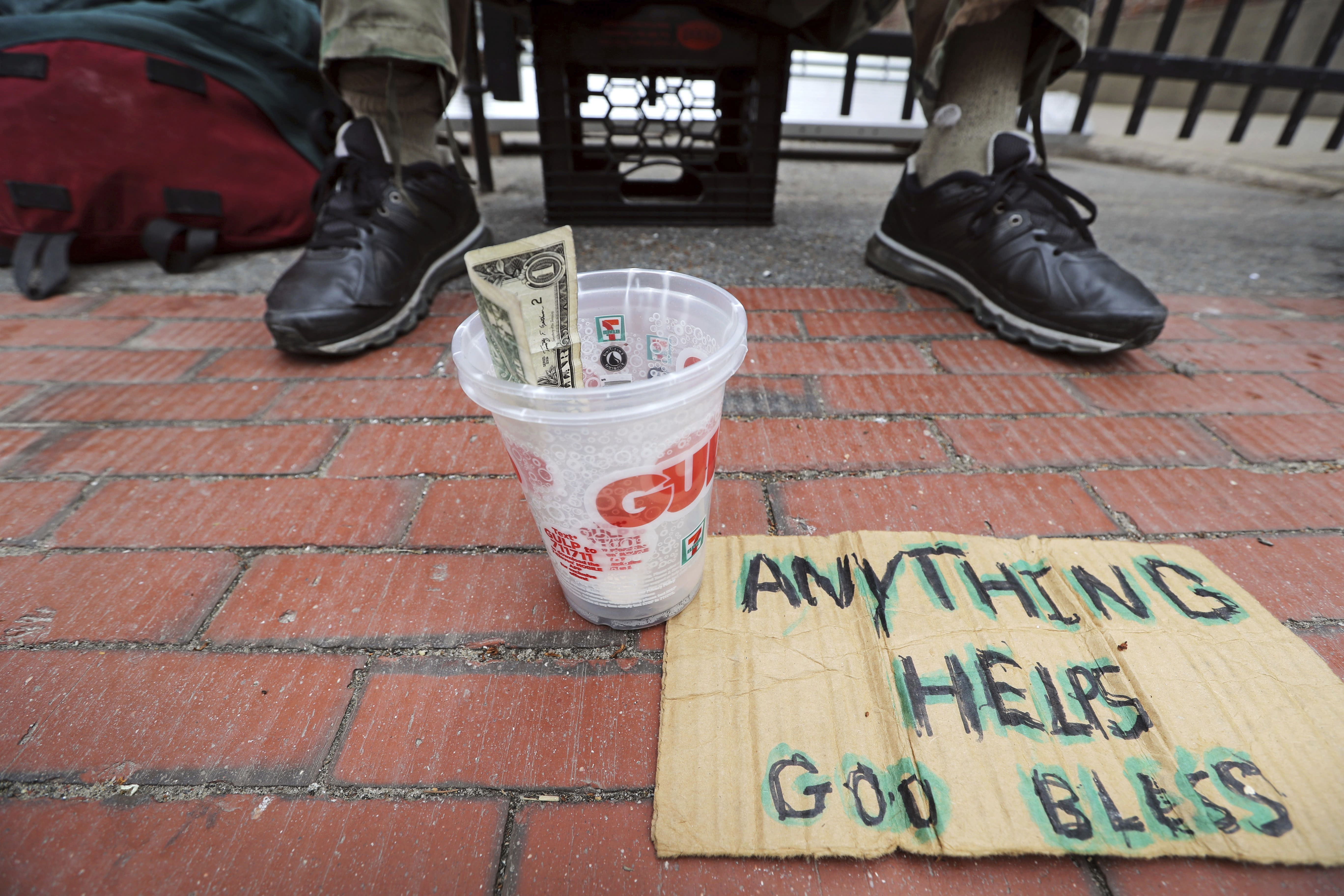 Plan to curb panhandling takes people from begging to work