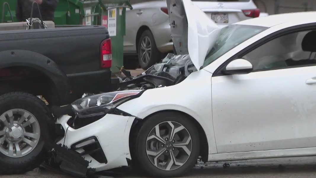 Car slams into school bus outside Milwaukee middle school