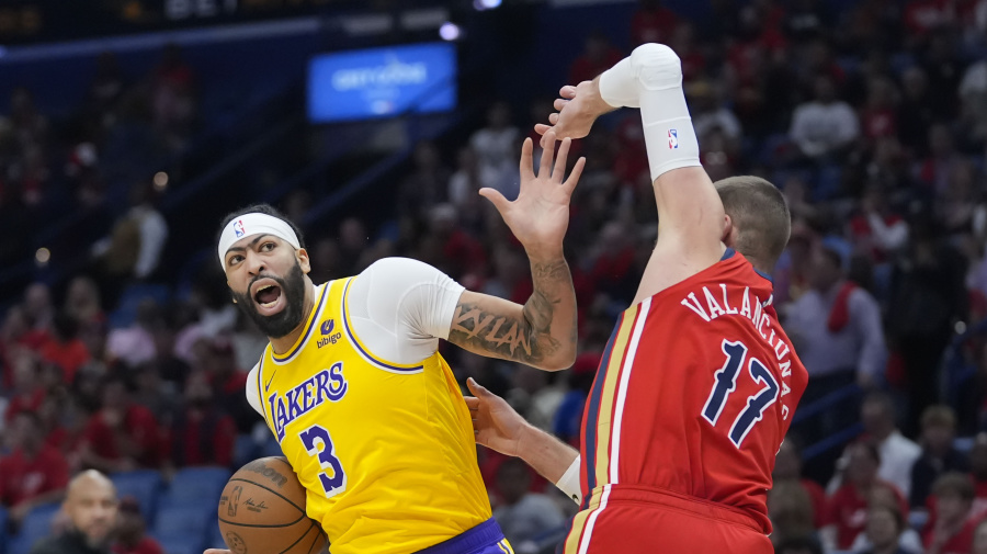 Associated Press - Los Angeles Lakers forward Anthony Davis (3) battles near the basket with New Orleans Pelicans center Jonas Valanciunas (17) in the first half of an NBA basketball play-in tournament game Tuesday, April 16, 2024, in New Orleans. (AP Photo/Gerald Herbert)