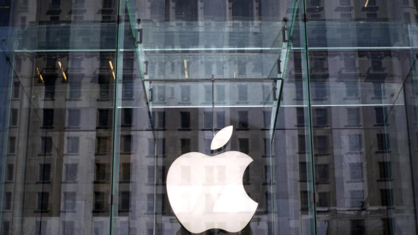 The Apple logo hangs inside the glass entrance to the Apple Store on 5th Avenue in New York City, April 4, 2013.  REUTERS/Mike Segar    (UNTIED STATES - Tags: BUSINESS SCIENCE TECHNOLOGY TELECOMS)