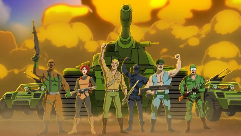 Trailer still for the upcoming beat ‘em up arcade-style game ‘G.I. Joe: Wrath of Cobra.’ It features Roadbloack, Scarlett, Duke, Snake Eyes and others standing in a line, fists raised in the air. Behind them is a massive army tank and other green military vehicles. Smoke and explosions are prominent in the background.