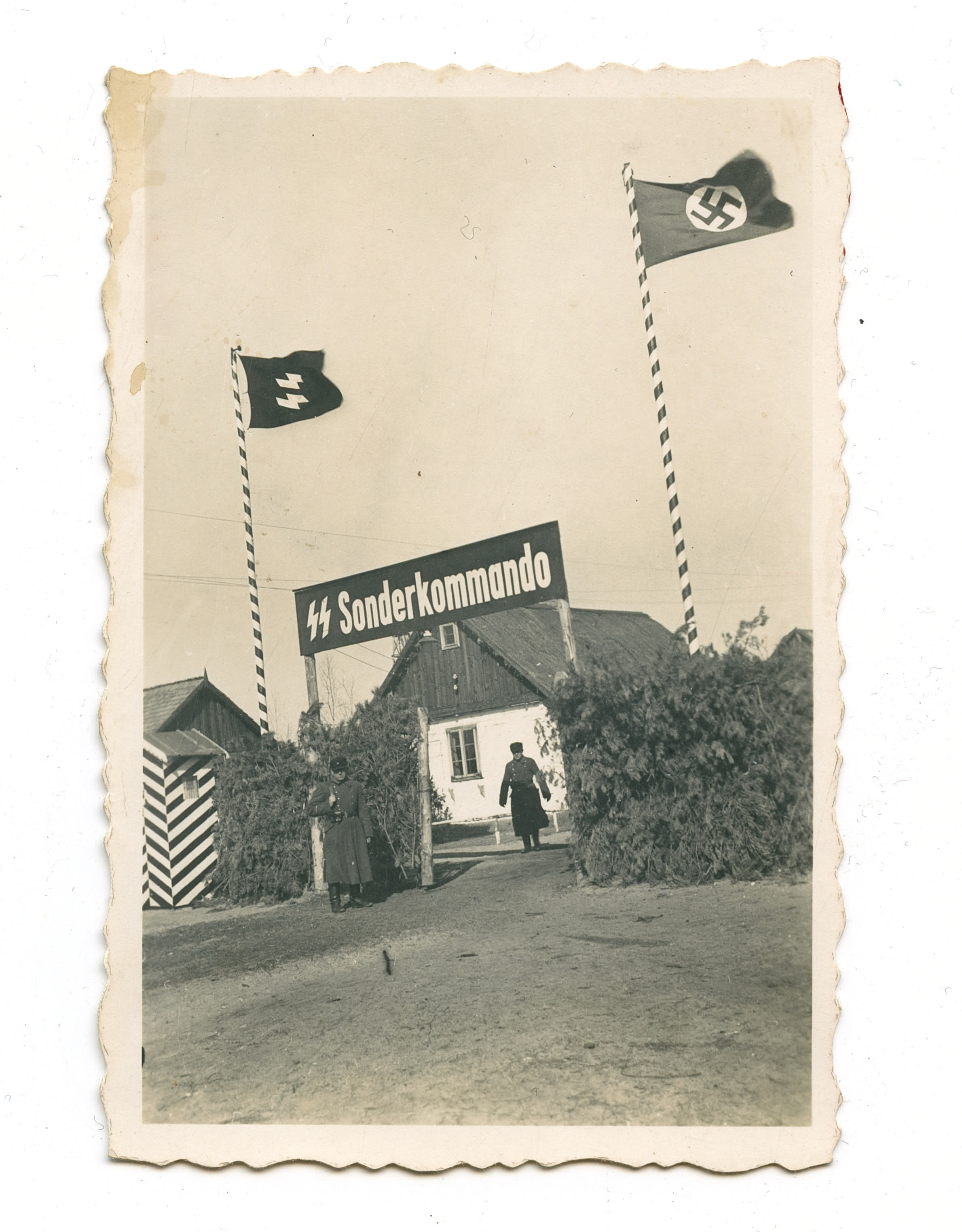 This 1942-43 photo provided by the U.S. Holocaust Memorial Museum shows a gate at the Nazi death camp Sobibor in German-occupied Poland. It's part of a collection of newly discovered photos kept by Johann Niemann, the deputy commander of the camp. (U.S. Holocaust Memorial Museum via AP)