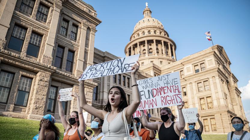 AUSTIN, TX - SEPT 1: Pro-choice protesters march outside the Texas State Capitol on Wednesday, Sept. 1, 2021 in Austin, TX. Texas passed SB8 which effectively bans nearly all abortions and it went into effect Sept. 1. A request to the Supreme Court to block the bill went unanswered and the Court still has yet to take any action on it. (Sergio Flores For The Washington Post via Getty Images)