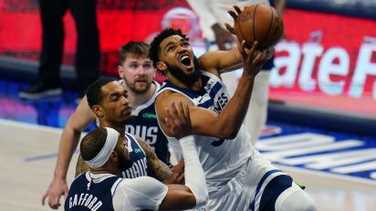 Associated Press - Minnesota Timberwolves center Karl-Anthony Towns (32) drives to the basket against Dallas Mavericks center Daniel Gafford (21) during the second half in Game 3 of the NBA basketball Western Conference finals, Sunday, May 26, 2024, in Dallas. (AP Photo/Gareth Patterson)