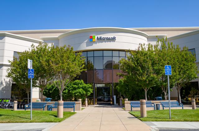 Facade with sign and logo at regional headquarters of computing company Microsoft in the Silicon Valley, Mountain View, California, May 3, 2019. (Photo by Smith Collection/Gado/Getty Images)