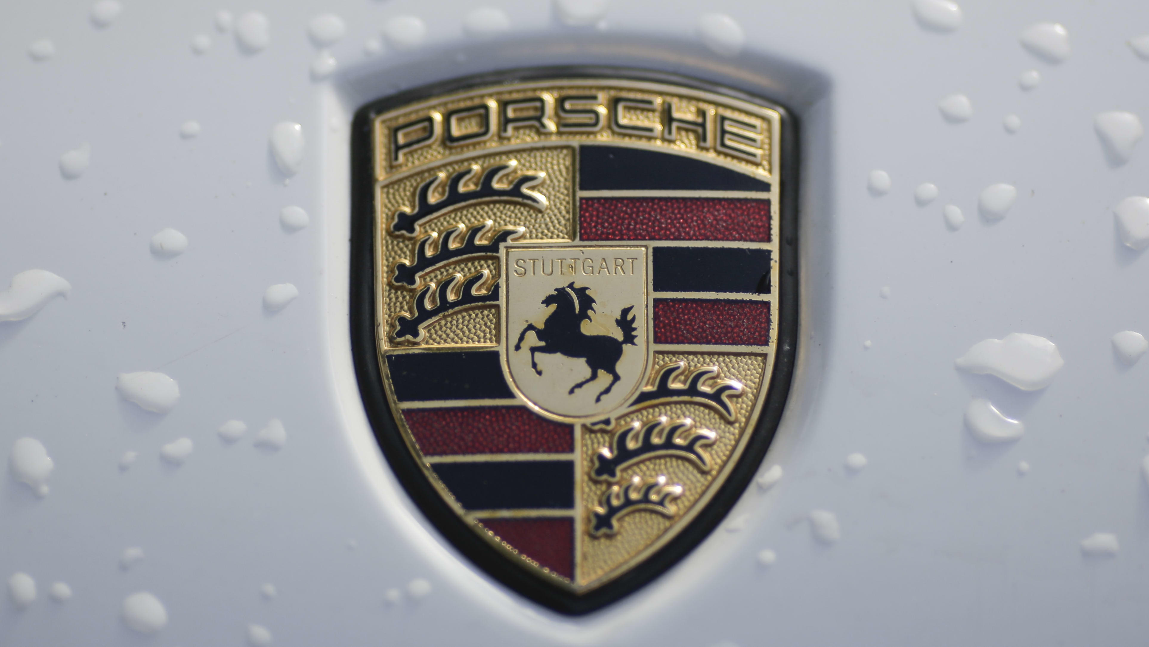 Porsche scales back EV target as global demand cools